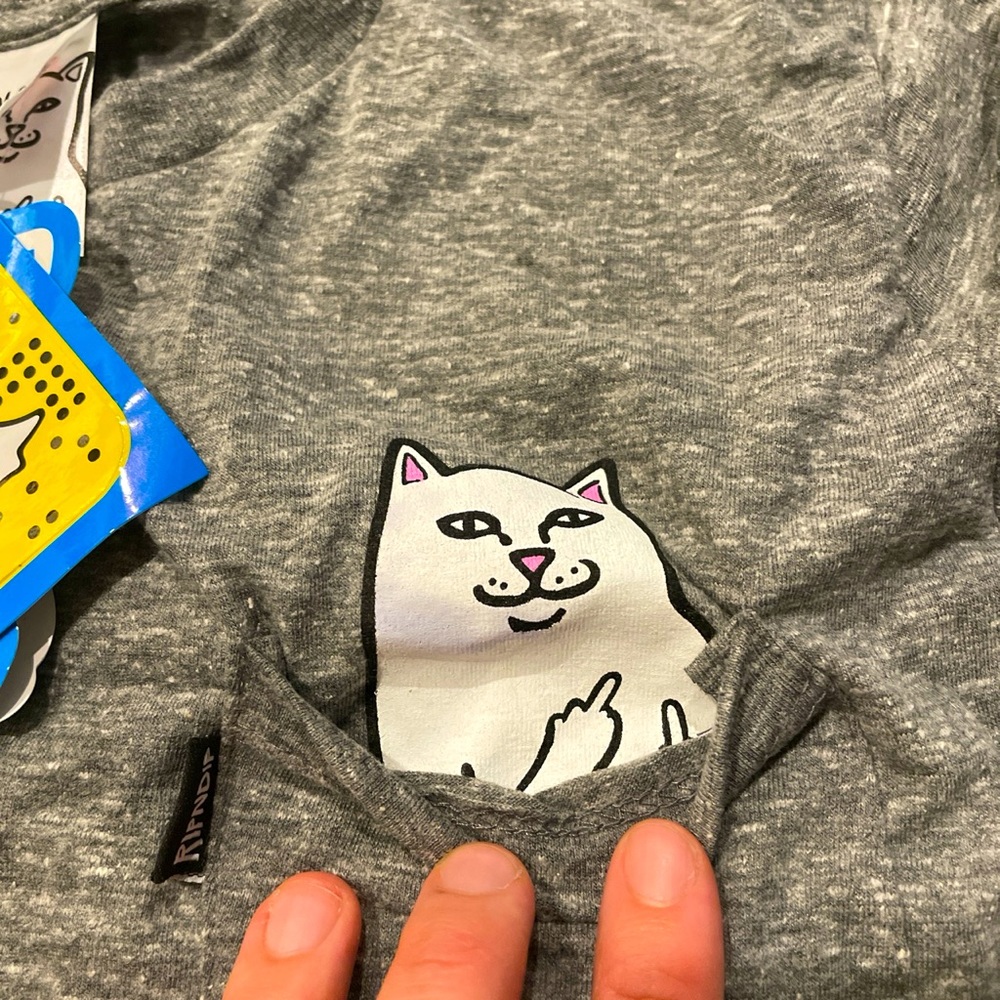Mischievous little kitten pocket t-shirt from Zumiez.